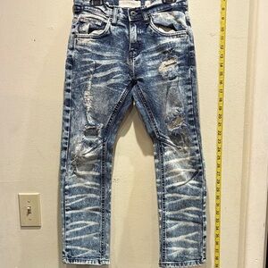 Evolution in Design Distressed Blue Jeans